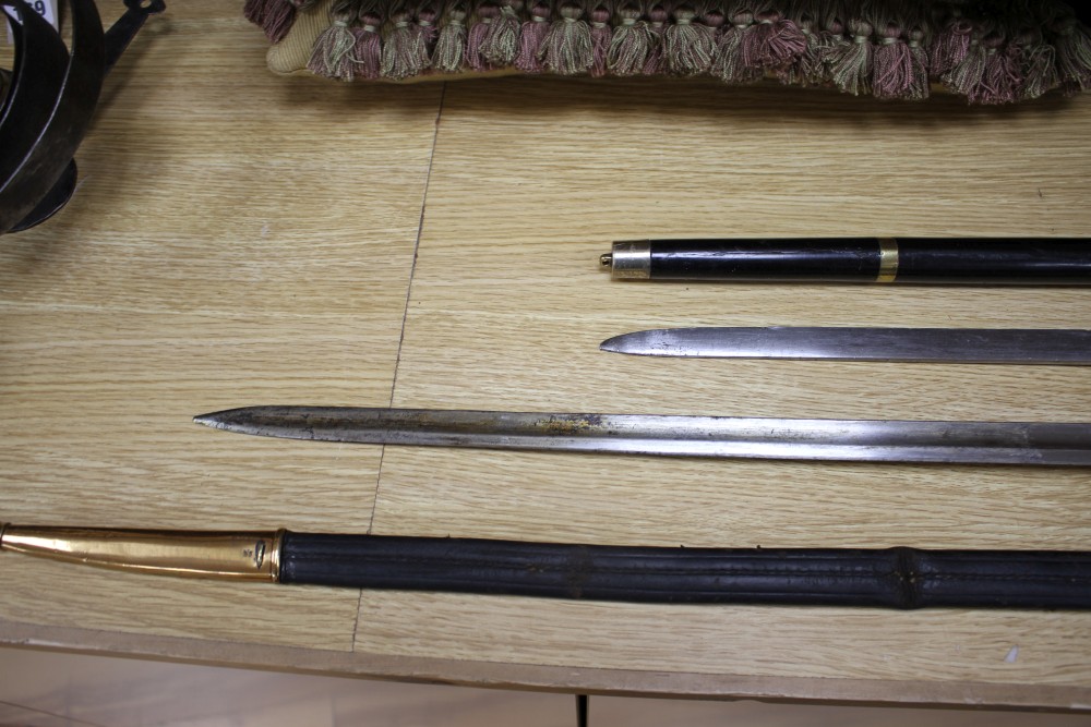 A Victorian brass hilted sword, the hilt stamped 126R.5.1 and a brass and plate mounted ebony swordstick